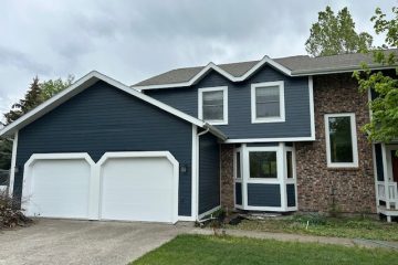 After photo 1 of the completed blue home exterior repaint project