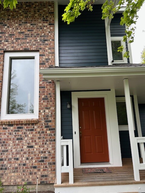After photo 4 of the completed blue home exterior repaint project