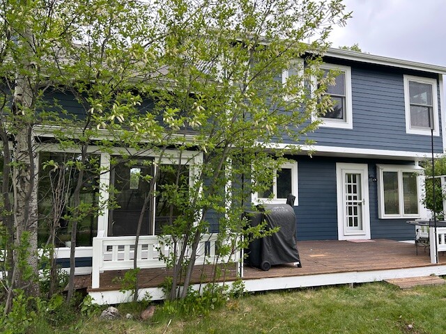After photo 7 of the completed blue home exterior repaint project