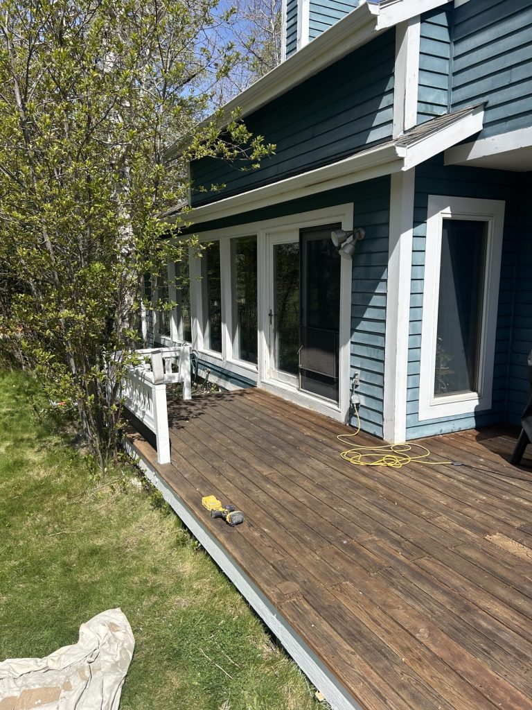 Before photo 3 of the blue home exterior repaint project