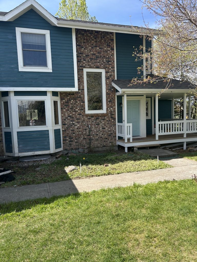 Before photo 6 of the blue home exterior repaint project